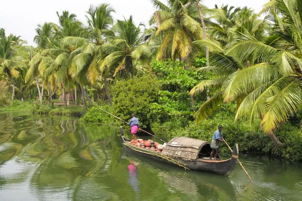 depositphotos_29796755-stock-photo-indian-men-in-traditional-boat